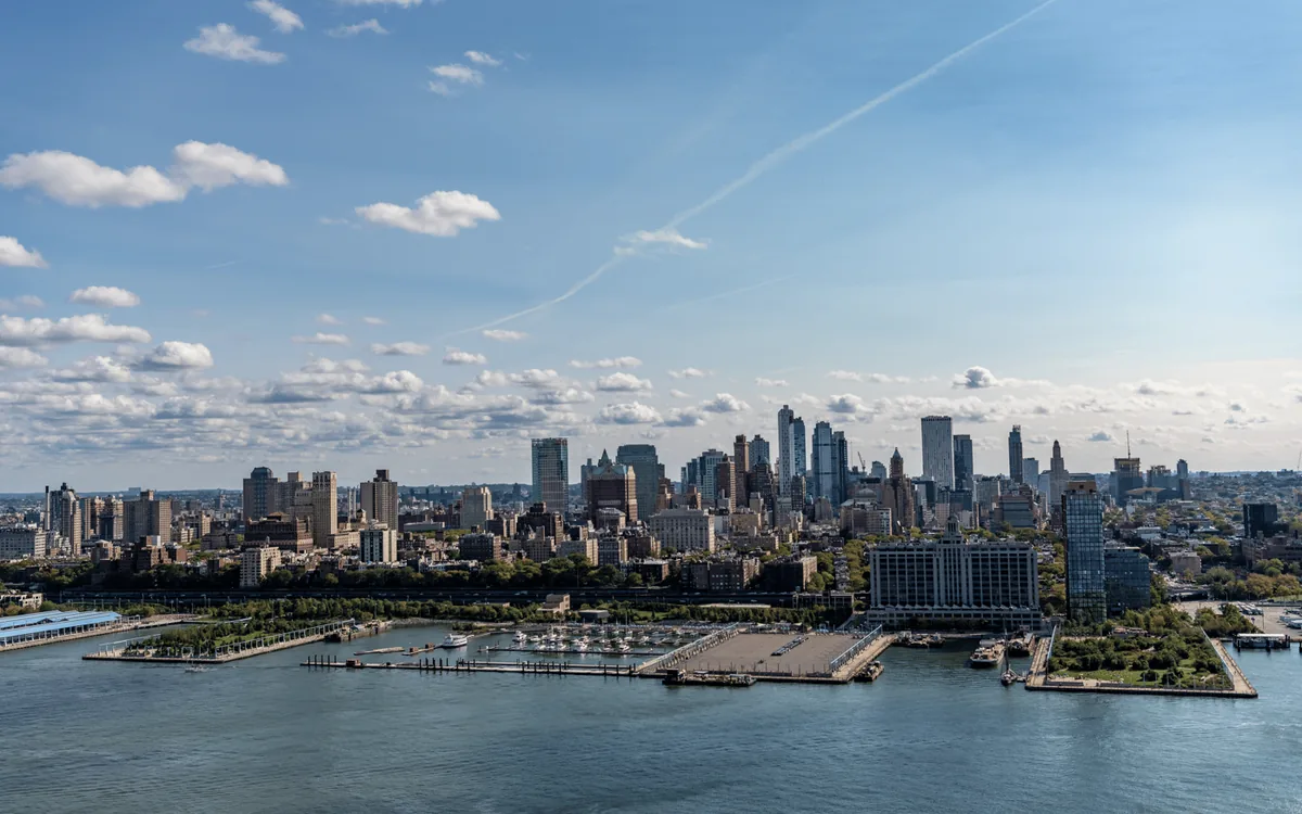 The full Manhattan skyline seen from a helicopter over the Hudson River